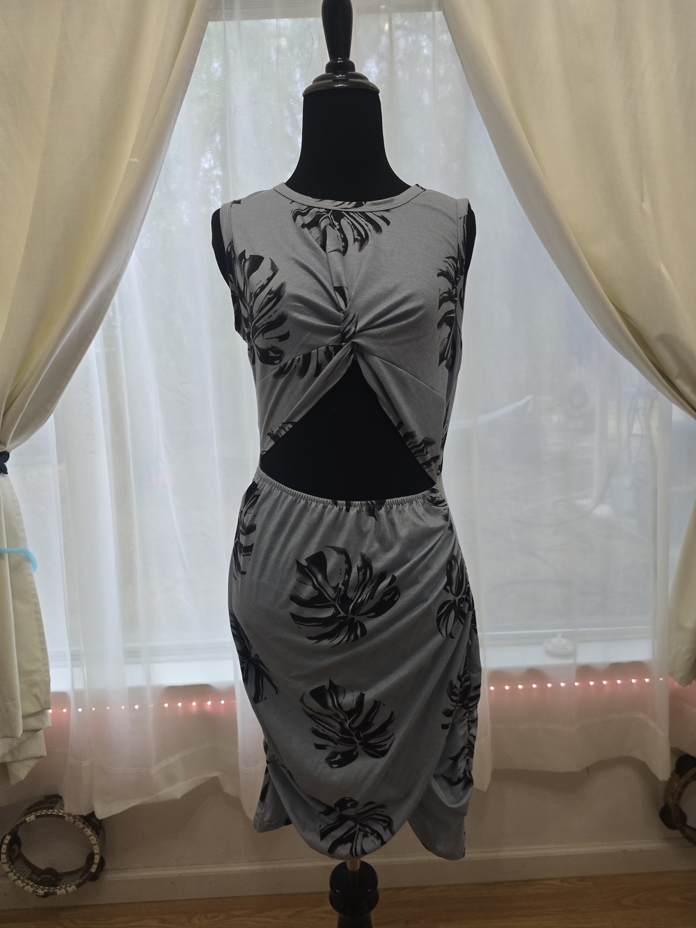 Sleeveless Twist Cutout Dress in Light Blue Gray with Black Leaf Print